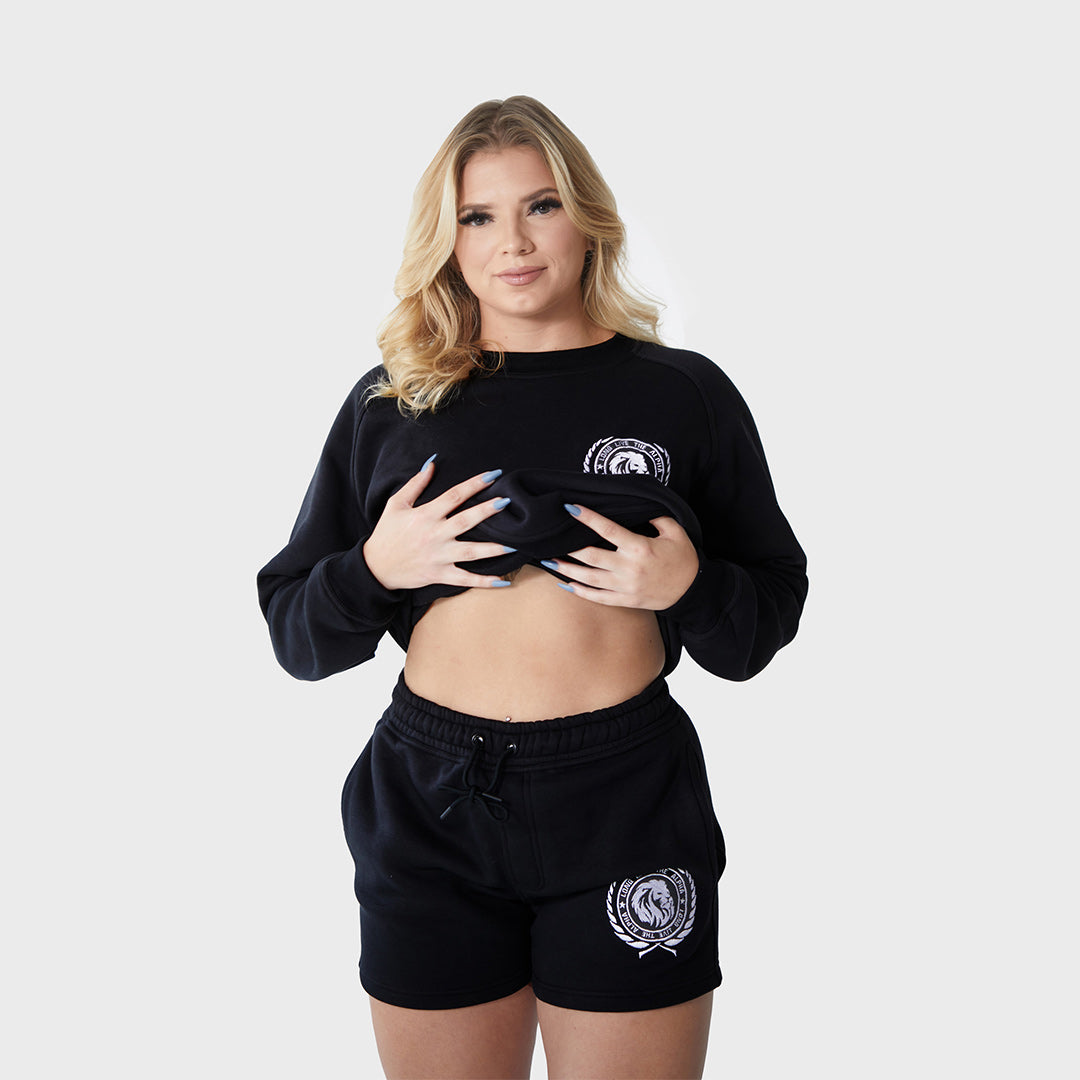 Women's Fleece Shorts - Soft fleece fabric for warmth and comfort. Elastic waistband with draw cord for secure and customizable fit. Side pockets for convenient storage. Embroidered lionhead logo. Thick durable fabric. Keeps you warm and cozy all day long. 70% Polyester, 30% Cotton. Model height: 5'5"/165cm. Model waist: 27"/68.58cm. Model is wearing size M