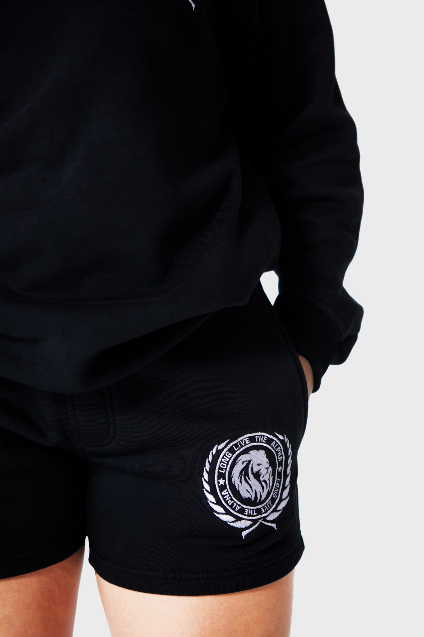 Women's Fleece Shorts - Stay warm and stylish with our shorts. Soft fleece fabric. Elastic waistband with draw cord for a secure and adjustable fit. Side pockets for storage. Embroidered lionhead logo. Thick durable fabric. 70% Polyester, 30% Cotton. Model height: 5'5"/165cm. Model waist: 27"/68.58cm. Model is wearing size M