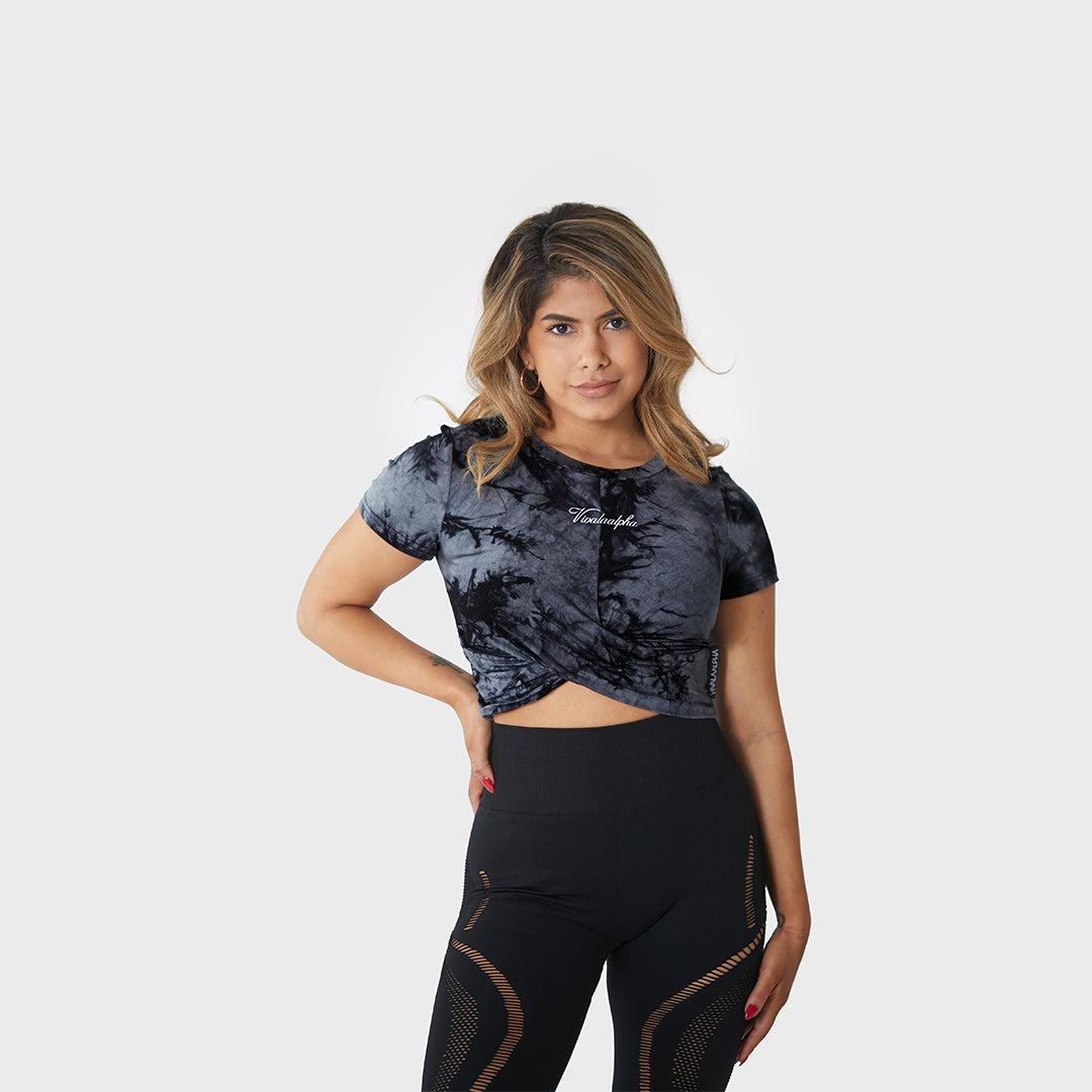 Tie Dye Crop Top - Soft and stretchy fabric for all-day comfort. Unique tie dye design adds a pop of color to any outfit. Cropped fit and short sleeves show off your style. Round neckline and relaxed fit make it easy to pair with a variety of bottoms. Perfect for running errands or a night out. Makes a statement and adds fun and flair to your wardrobe