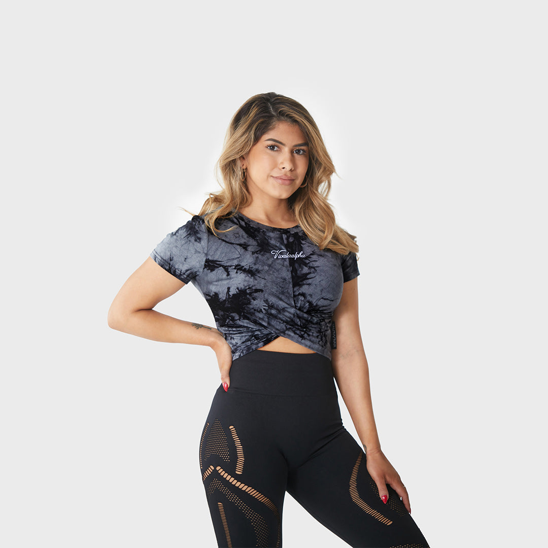 Women's Tie Dye Crop Top - Soft and stretchy fabric for maximum comfort. Eye-catching tie dye design adds a unique touch to any outfit. Cropped fit and short sleeves show off your style. Round neckline and relaxed fit make it easy to pair with a variety of bottoms. Perfect for running errands or dressing up for a night out. Make a statement with this fun and fashionable top